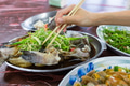Steamed fish served in Taiwanese stir fry restaurant - PhotoDune Item for Sale