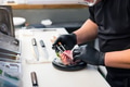 Japanese chef slicing fresh sashimi in restaurant kitchen - PhotoDune Item for Sale