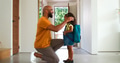 Father Saying Goodbye To Daughter As She Leaves Home For School - PhotoDune Item for Sale