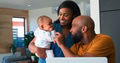 African American Family With Baby Daughter Using Laptop To Check Finances At Home - PhotoDune Item for Sale