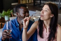 Couple enjoying wine together at home, smiling and celebrating special moments - PhotoDune Item for Sale