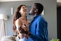 Couple dancing joyfully at home, sharing happy and intimate moment - PhotoDune Item for Sale