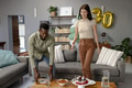 African American man and woman arranging cake and snacks for birthday celebration - PhotoDune Item for Sale