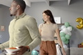 African American man and woman celebrating birthday at home with balloons and snacks - PhotoDune Item for Sale
