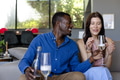 Couple celebrating at home, enjoying champagne and sharing joyful moments together - PhotoDune Item for Sale