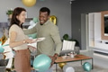 African American man and woman celebrating at home with balloons and cake - PhotoDune Item for Sale
