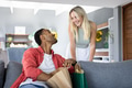Couple enjoying shopping together at home, sharing joyful smiles and conversation - PhotoDune Item for Sale