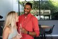 Couple celebrating at home, smiling and holding champagne glasses, enjoying moment - PhotoDune Item for Sale