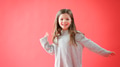 Portrait Of Girl Against Red Studio Background Smiling At Camera - PhotoDune Item for Sale