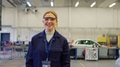 Female Student Wearing Safety Glasses Studying For Auto Mechanic Apprenticeship At College - PhotoDune Item for Sale