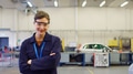Portrait Of Female Student With Safety Glasses Studying For Auto Mechanic Apprenticeship At College - PhotoDune Item for Sale