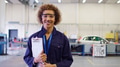 Portrait Of Female Tutor With Safety Glasses Teaching Auto Mechanic Apprenticeship At College - PhotoDune Item for Sale