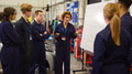 Female Tutor By Whiteboard With Students Teaching Auto Mechanic Apprenticeship At College - PhotoDune Item for Sale