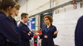 Female Tutor By Whiteboard With Students Teaching Auto Mechanic Apprenticeship At College - PhotoDune Item for Sale