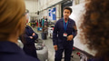 Male Tutor By Whiteboard With Students Teaching Auto Mechanic Apprenticeship At College - PhotoDune Item for Sale