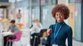 Portrait Of Smiling Female College Student In Busy Communal Campus Building - PhotoDune Item for Sale