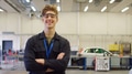 Portrait Of Male Student Wearing Safety Glasses Studying For Auto Mechanic Apprenticeship At College - PhotoDune Item for Sale
