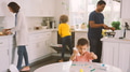 Family At Home In Kitchen Cooking, Doing Chores And Painting Picture - PhotoDune Item for Sale