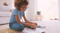 Girl Sitting On Floor in Lounge At Home Building Construction Kit - PhotoDune Item for Sale