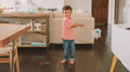 Portrait Of Young Boy Helping With Chores Using Floor Mop At Home - PhotoDune Item for Sale