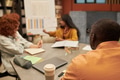 Diverse Young People Collaborating during Business Presentation in Library - PhotoDune Item for Sale