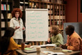 Woman Teaching Diverse Young People Spanish Vocabulary - PhotoDune Item for Sale