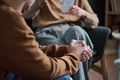 Young Man Participating in Group Therapy Counseling Session - PhotoDune Item for Sale