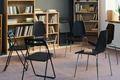 Chairs Forming Circle in Library Setting Preparing for Group Therapy Meeting - PhotoDune Item for Sale