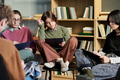 Diverse Teenagers Participating in Group Therapy Session and Taking Notes - PhotoDune Item for Sale