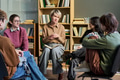 Adult Woman Leading Group Therapy Session with Diverse Teenagers - PhotoDune Item for Sale