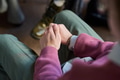 Young Man Sitting with Hands Clasped during Group Therapy Session - PhotoDune Item for Sale