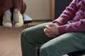 Young Man Sitting with Hands Clasped during Group Therapy - PhotoDune Item for Sale
