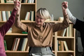 Adult Woman Celebrating Success during Group Therapy Session - PhotoDune Item for Sale