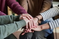 Diverse Young People Stacking Hands Demonstrating Support during Group Therapy - PhotoDune Item for Sale