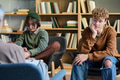 Teenage Boys Participating in Group Therapy Session with Counselor - PhotoDune Item for Sale