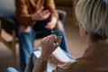 Adult Woman Leading Group Therapy Session with Young Adult - PhotoDune Item for Sale