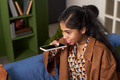 Young South Asian Woman Using Smartphone Voice Assistant Indoors - PhotoDune Item for Sale