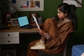 Young South Asian Woman Analyzing Financial Report While Working Remotely - PhotoDune Item for Sale