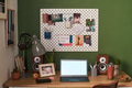 Home Office Desk Featuring Laptop and Personal Items on Wooden Surface - PhotoDune Item for Sale