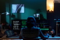 Young Woman Coding on Computer Monitors in Dark Home Office Setting - PhotoDune Item for Sale