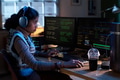 Young South Asian Woman Coding on Multiple Monitors at Night in Office - PhotoDune Item for Sale