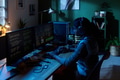 Young Woman Coding Software on Multiple Computer Monitors at Night - PhotoDune Item for Sale