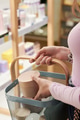 Young Woman Shopping for Skincare Products in Store Aisle - PhotoDune Item for Sale