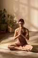 Young Adult Caucasian Woman Practicing Mindful Breathing While Seated Indoors - PhotoDune Item for Sale