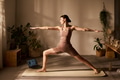 Young Adult Caucasian Woman Practicing Yoga Posing in Front of Laptop Indoors - PhotoDune Item for Sale