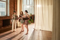 Group of Young Adult Caucasian Women Chatting after Yoga Class Indoors - PhotoDune Item for Sale