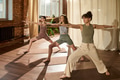 Group of Young Adult Caucasian Women Practicing Yoga in Studio Together - PhotoDune Item for Sale
