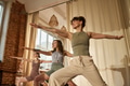 Group of Young Adult Caucasian Women Practicing Yoga Poses Indoors Together - PhotoDune Item for Sale