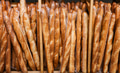 Row of bread loaves are displayed in a wooden case. - PhotoDune Item for Sale