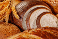 Fresh baked bread. Assorted bakery products loafs of bread and rolls... - PhotoDune Item for Sale